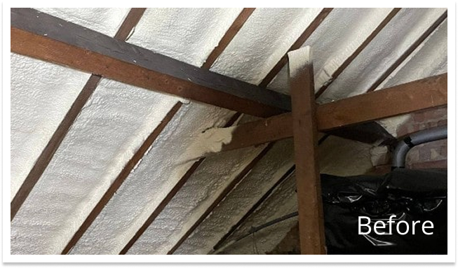 Spray foam in a roof before it has been removed.